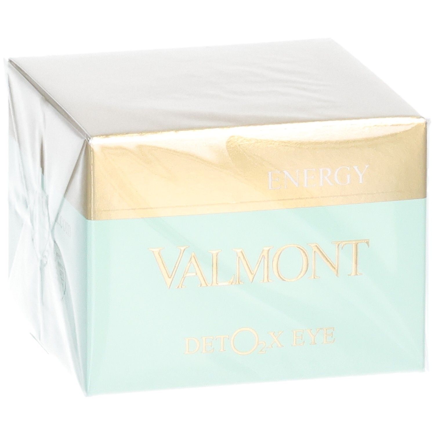 Emballage VALMONT Deto2X Eye, vue en biais avec accents dorés et menthe.