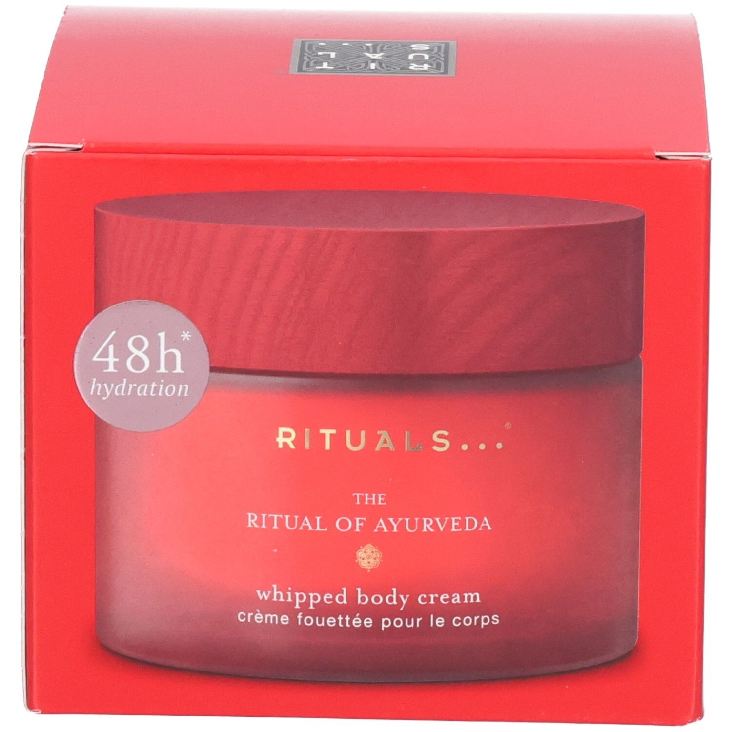 Boîte d'emballage RITUALS The Ritual of Ayurveda Body Cream avec indication 48h d'hydratation et design rouge.