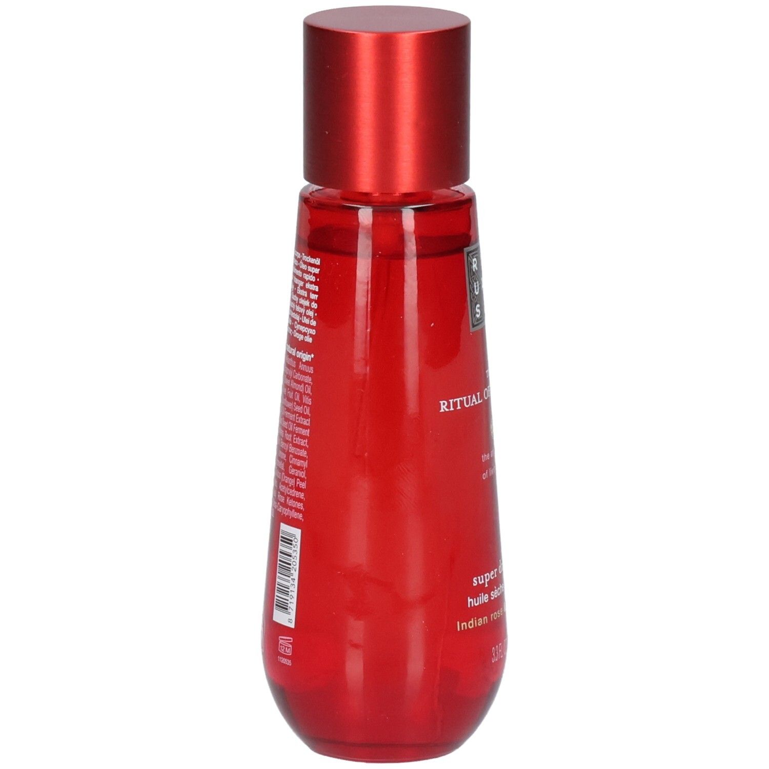 Bouteille rouge avec bouchon rouge, dos avec ingrédients et code-barres. RITUALS The Ritual of Ayurveda Super Dry Body Oil.