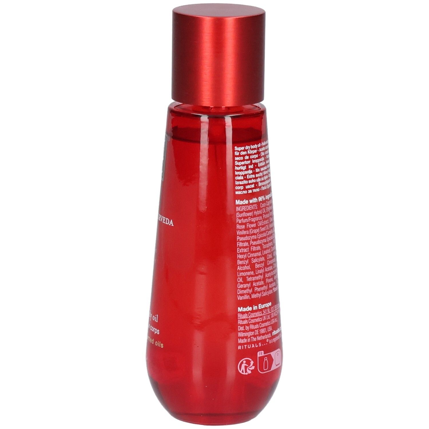 Bouteille rouge avec bouchon rouge, dos avec ingrédients et code-barres. RITUALS The Ritual of Ayurveda Super Dry Body Oil.