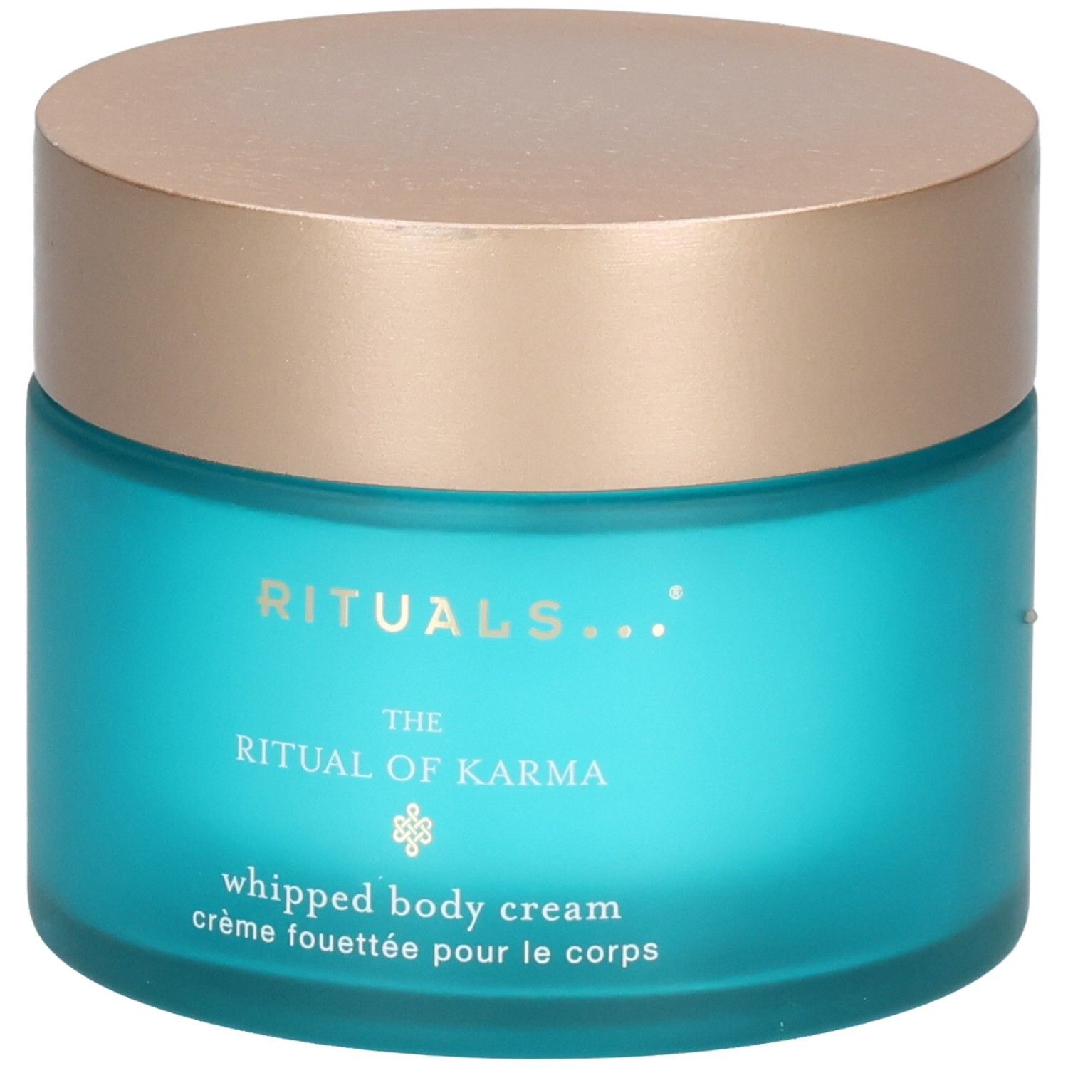 RITUALS The Ritual of Karma Crème Corps Fouettée dans un pot en verre bleu avec un couvercle doré.