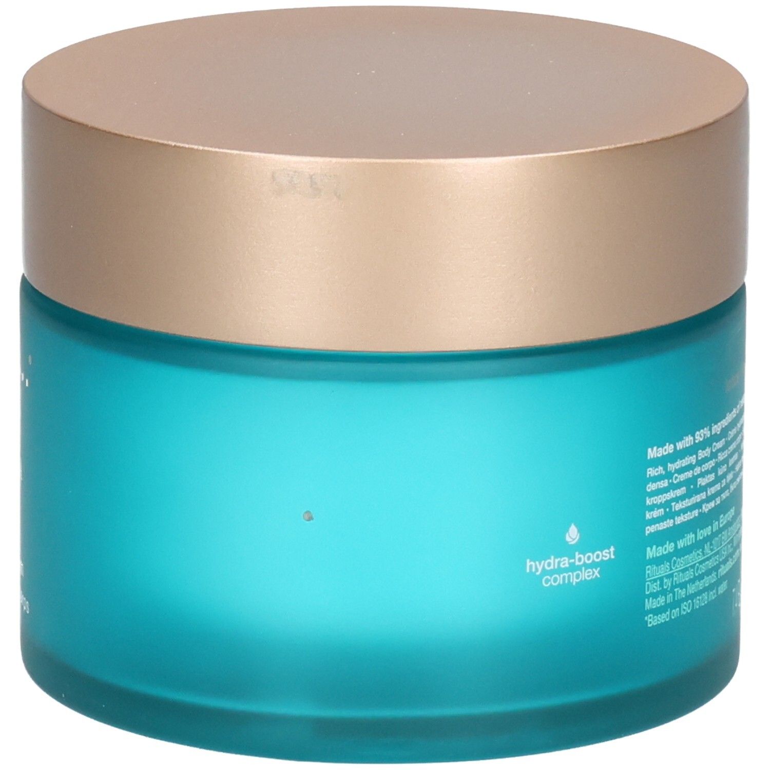 RITUALS The Ritual of Karma Crème Corps, vue latérale du pot en verre bleu avec couvercle doré et symbole Hydra-Boost Complex.