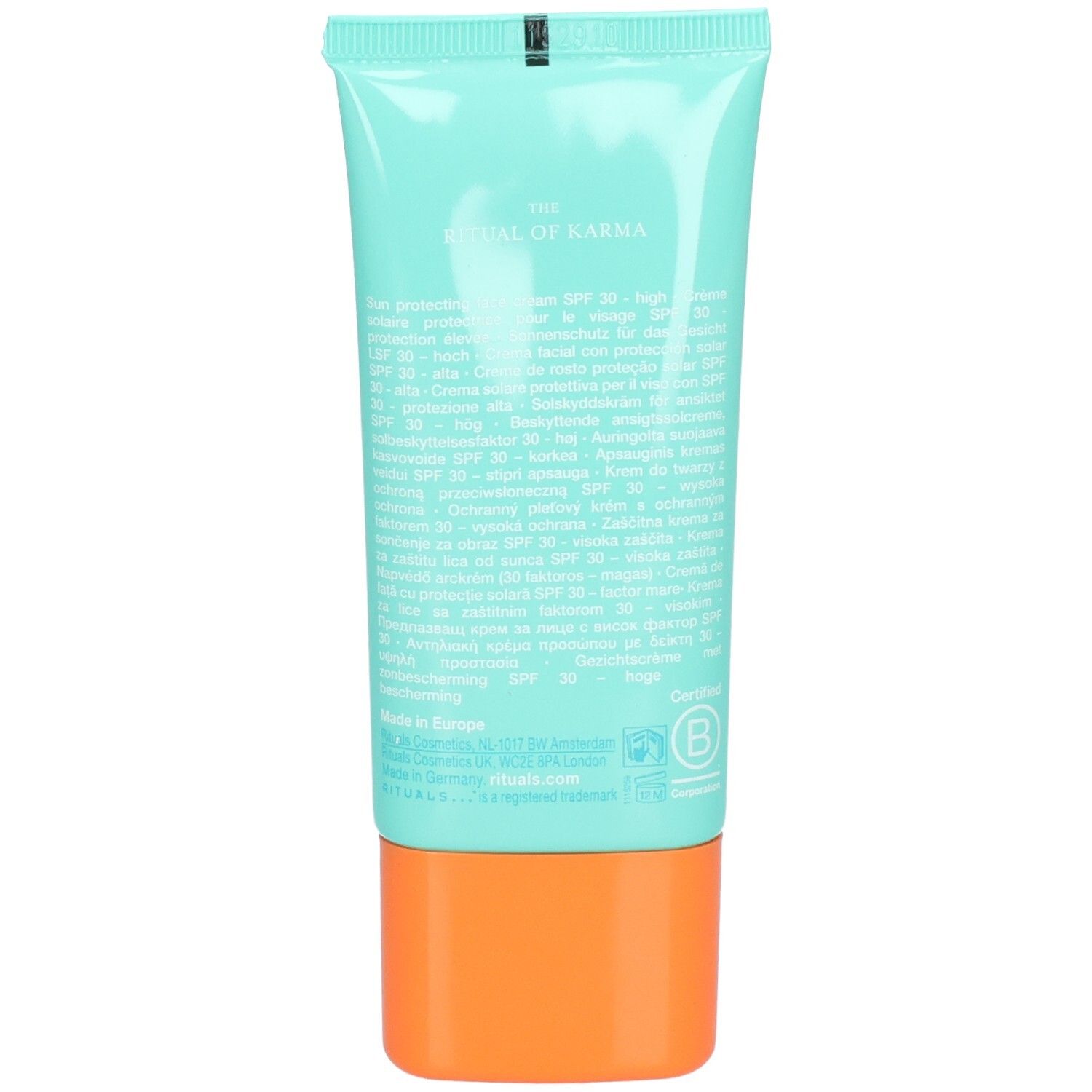Arrière d'un tube turquoise avec bouchon orange. Contient des informations produit et ingrédients.