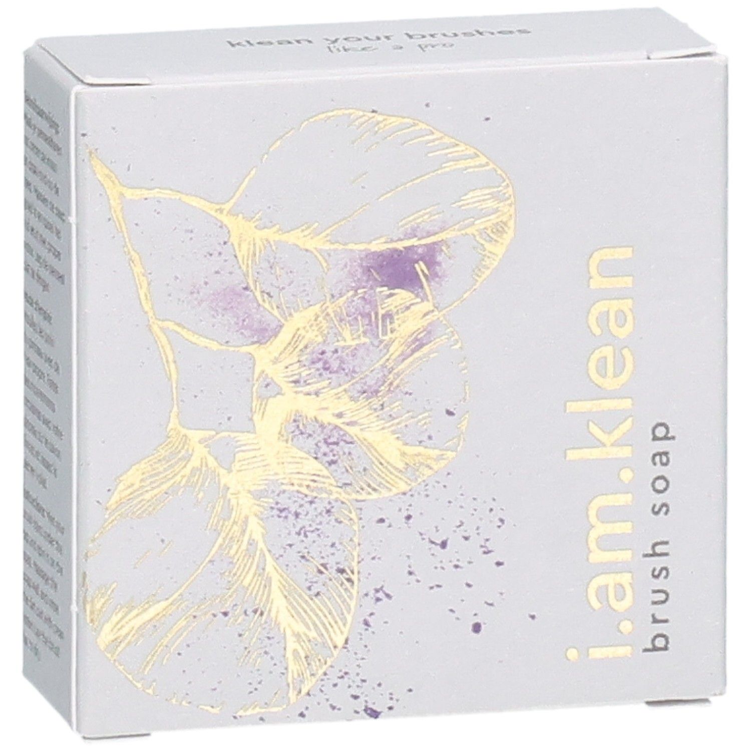 Boîte en carton avec motif floral et nom du produit i.am.klean Brush Soap. Vue oblique.