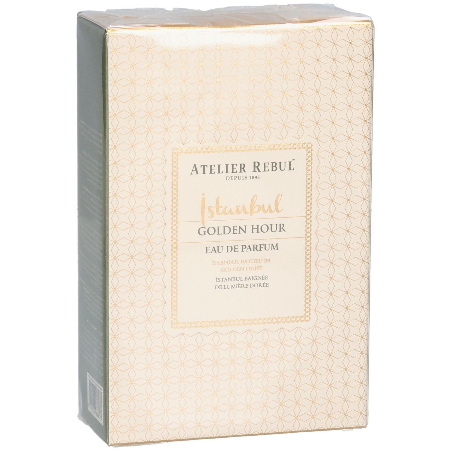 Vue de face de l'emballage Atelier Rebul Istanbul Golden Hour Eau de Parfum. Boîte beige à motifs dorés.