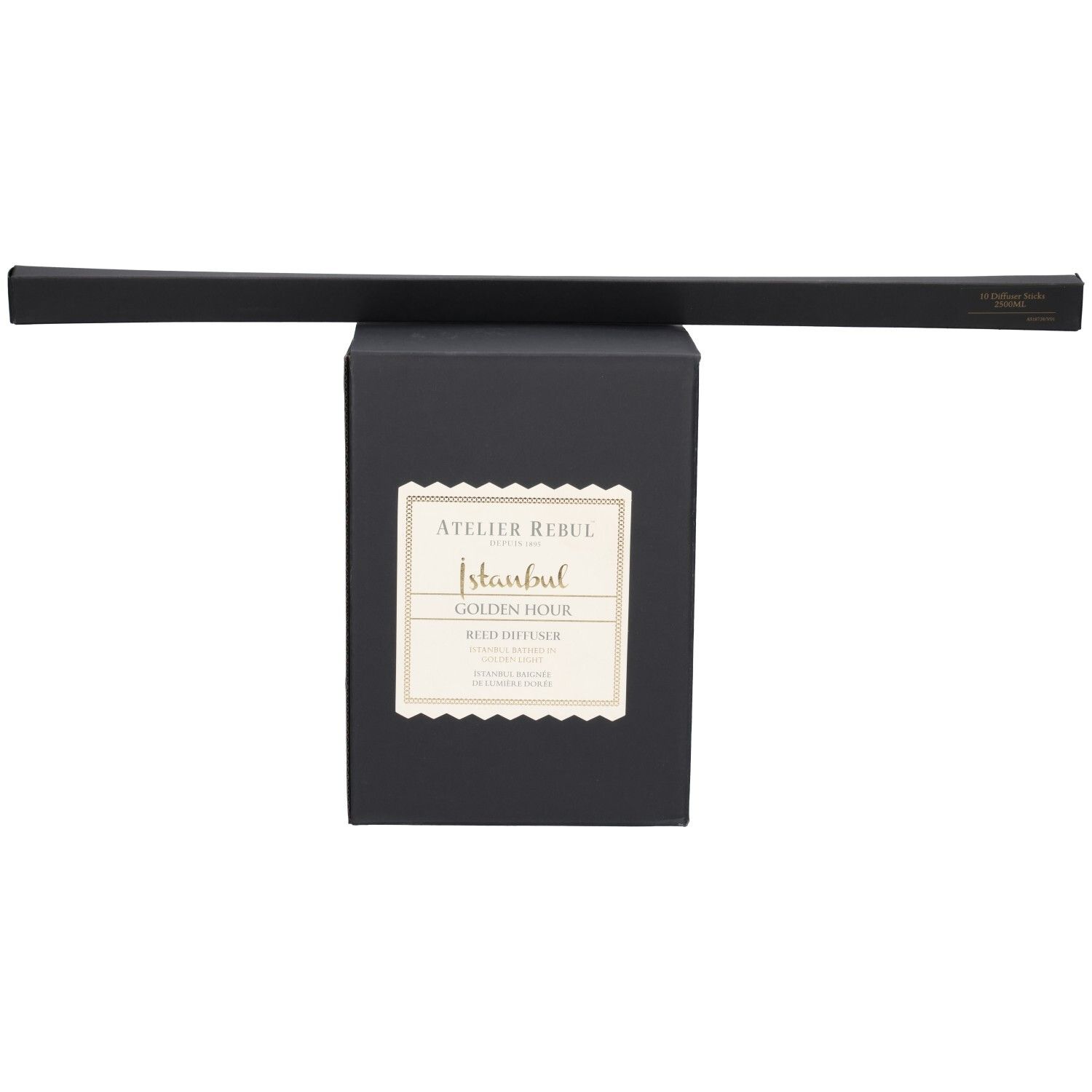 Boîte noire avec diffuseur de roseaux Atelier Rebul Istanbul Golden Hour et une tige parfumée.