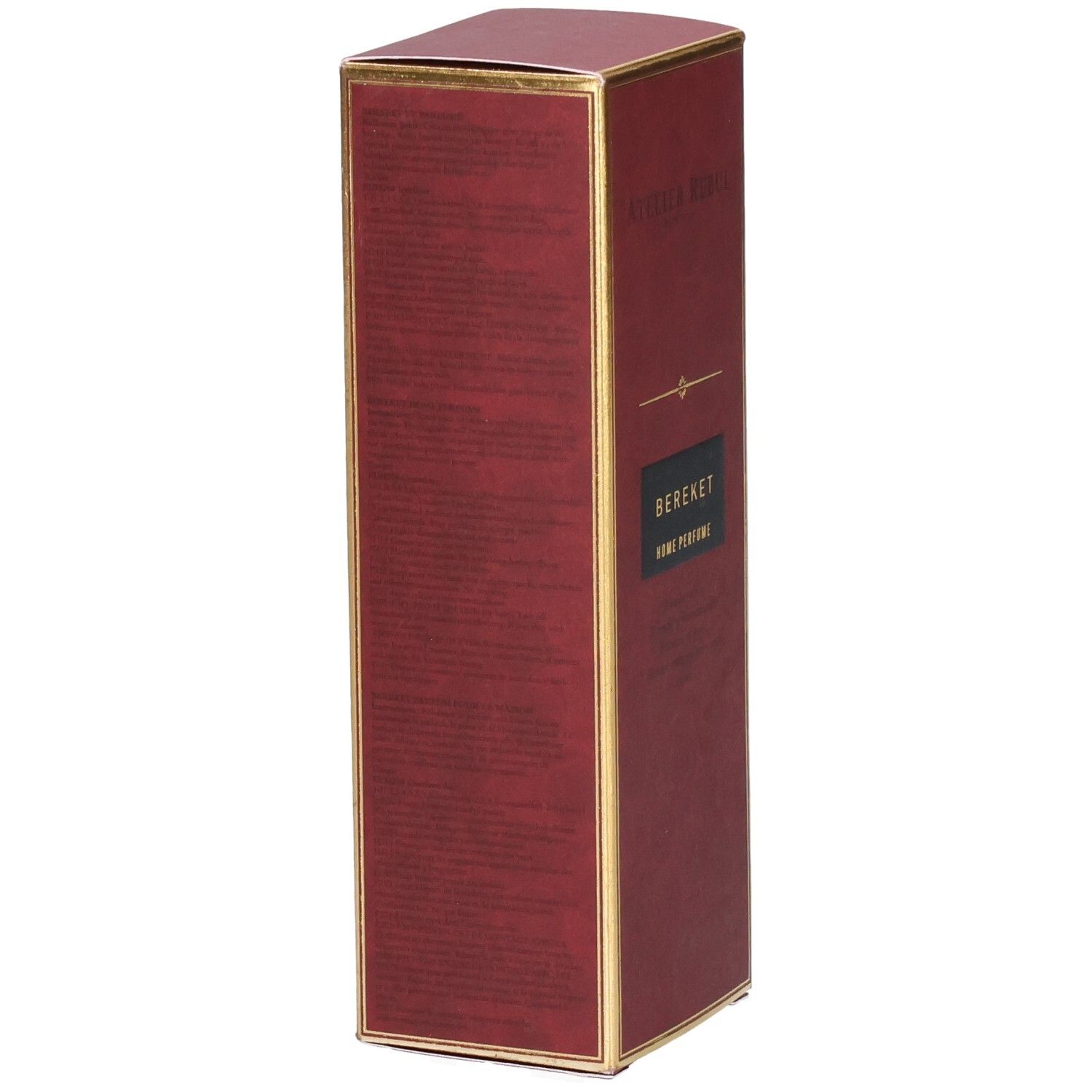 Boîte rouge avec bordure dorée, inscription "Atelier Rebul Bereket Home Perfume".