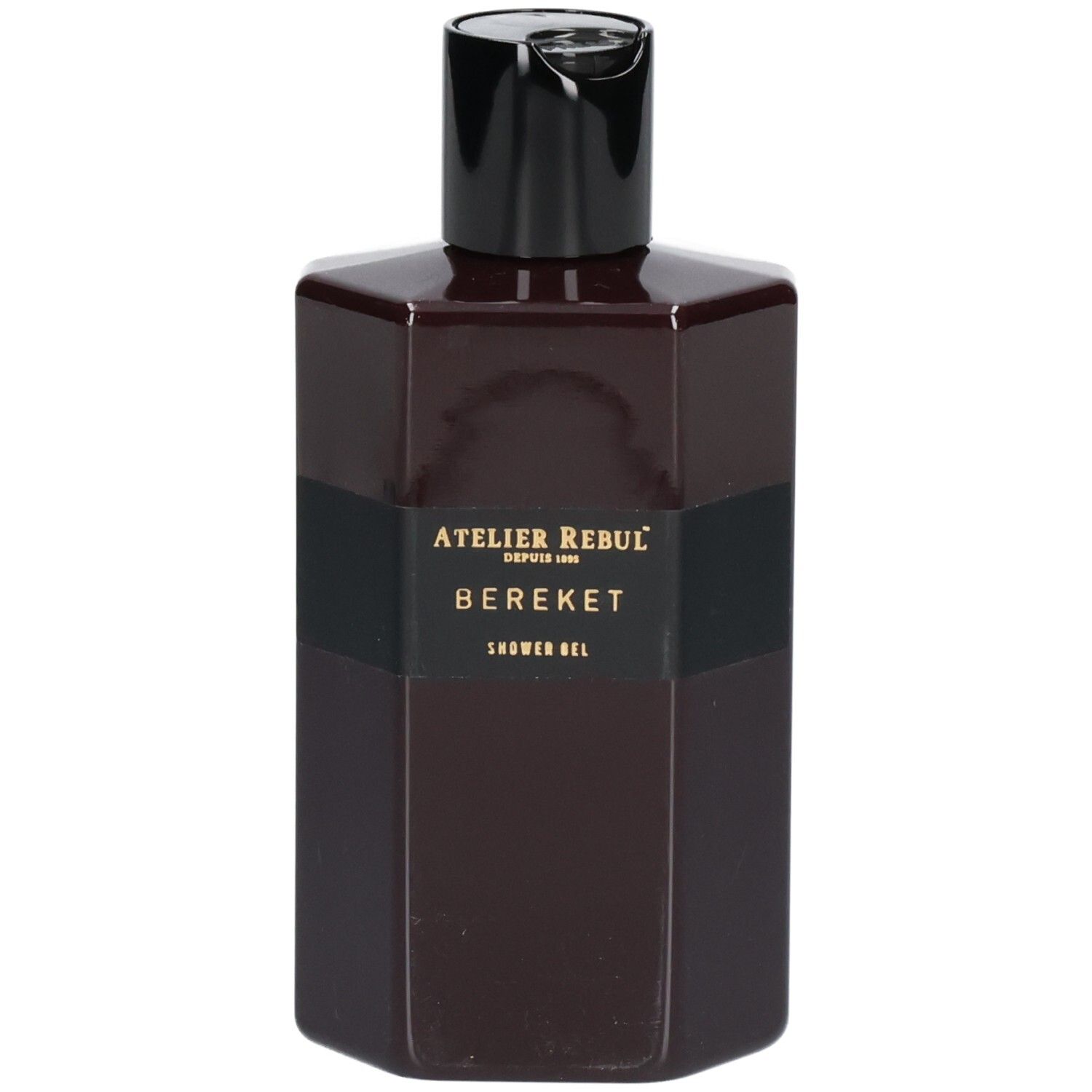 Bouteille hexagonale brun foncé avec étiquette et bouchon noirs. Contient Atelier Rebul Bereket Shower Gel.