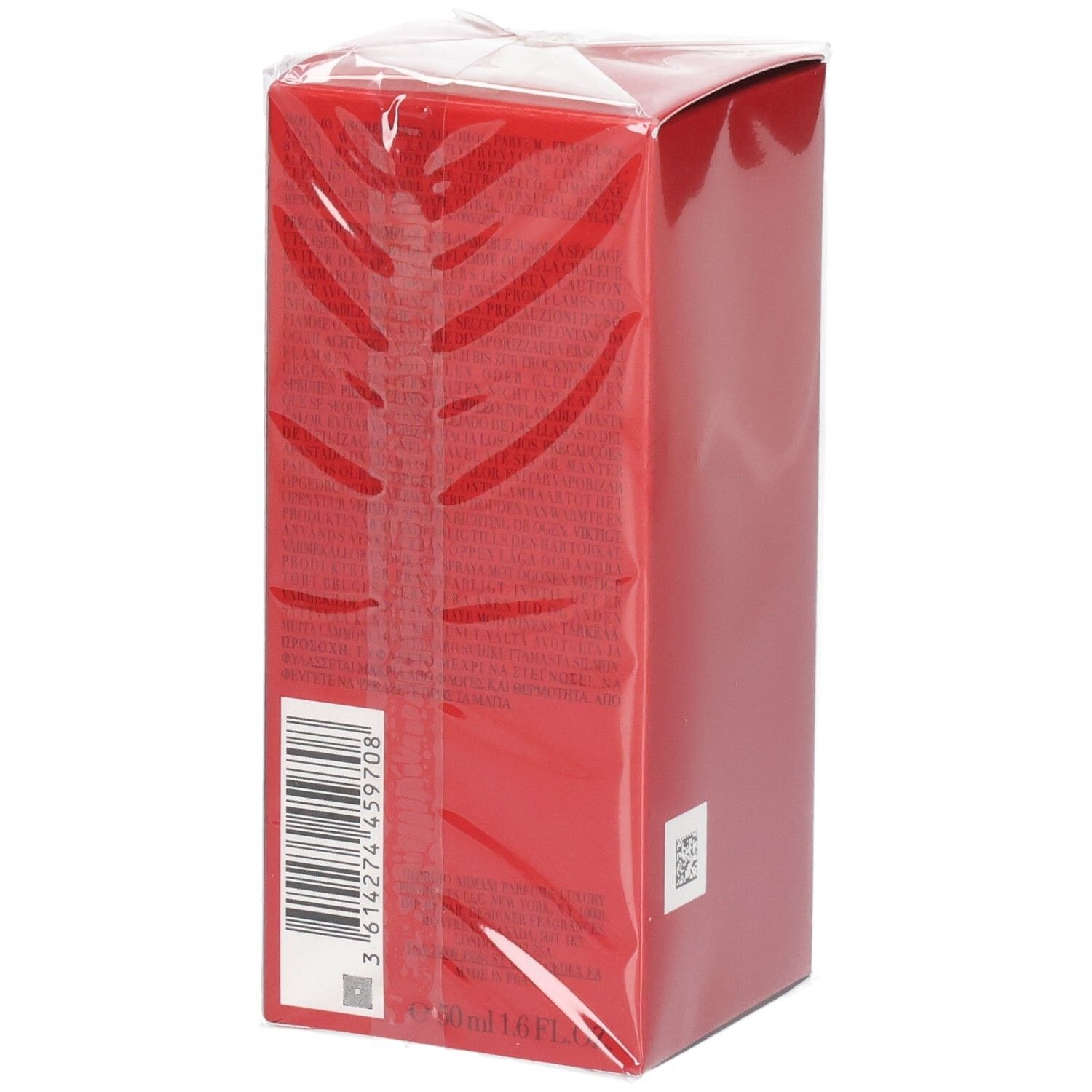 Boîte rouge avec code-barres et texture, emballée sous film transparent.