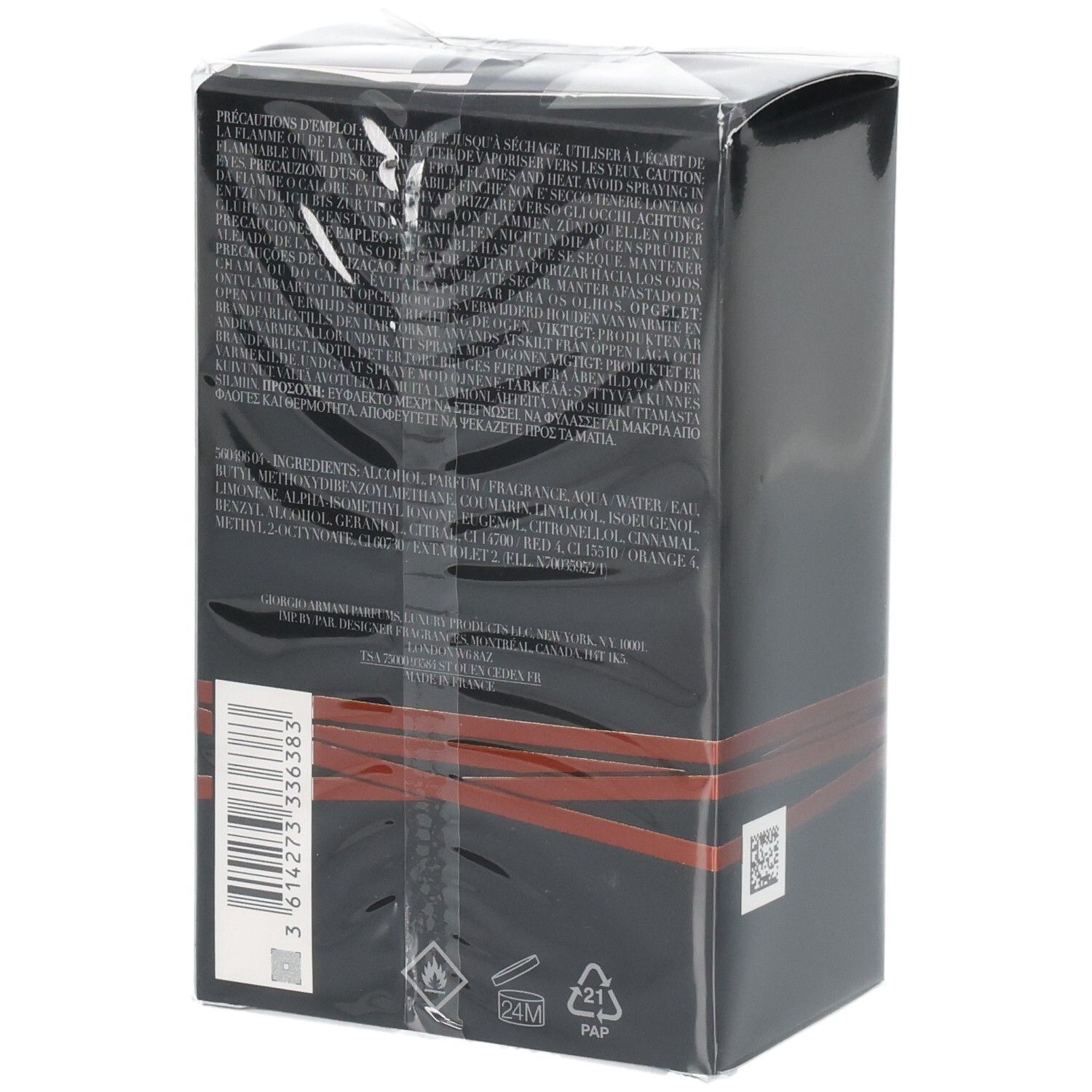 Emballage produit noir avec des bandes rouges et des informations textuelles.