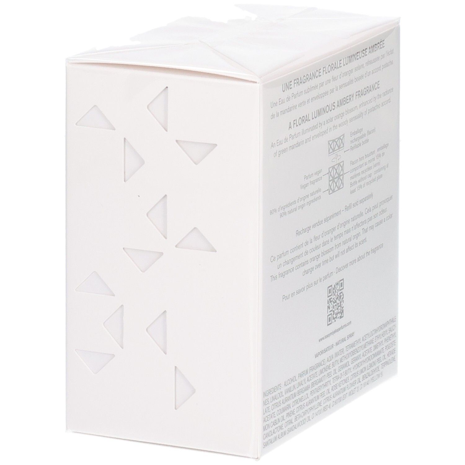 Vue de côté de l'emballage Issey Miyake Lumière d'Issey Eau de Parfum, blanc avec des triangles géométriques.
