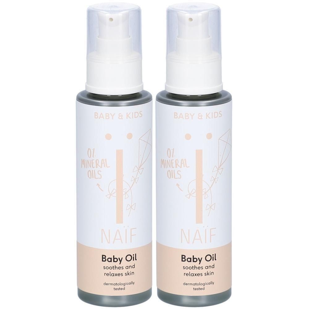 Deux flacons d'huile pour bébé Naïf Baby & Kids avec pompes.