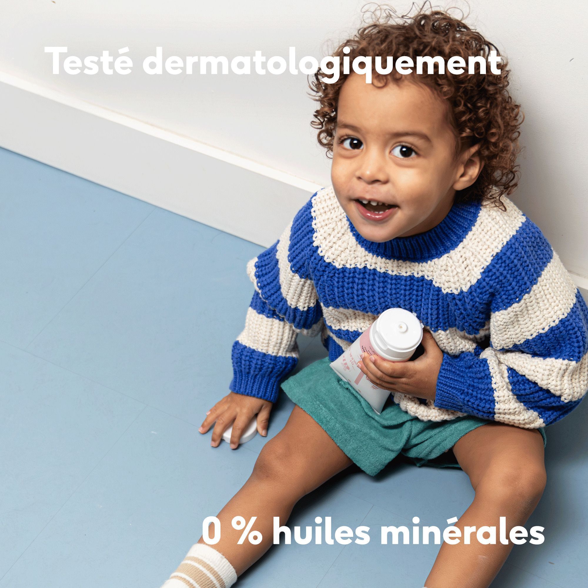Évaluation de la lotion corporelle Naïf avec 5 étoiles et texte positif.