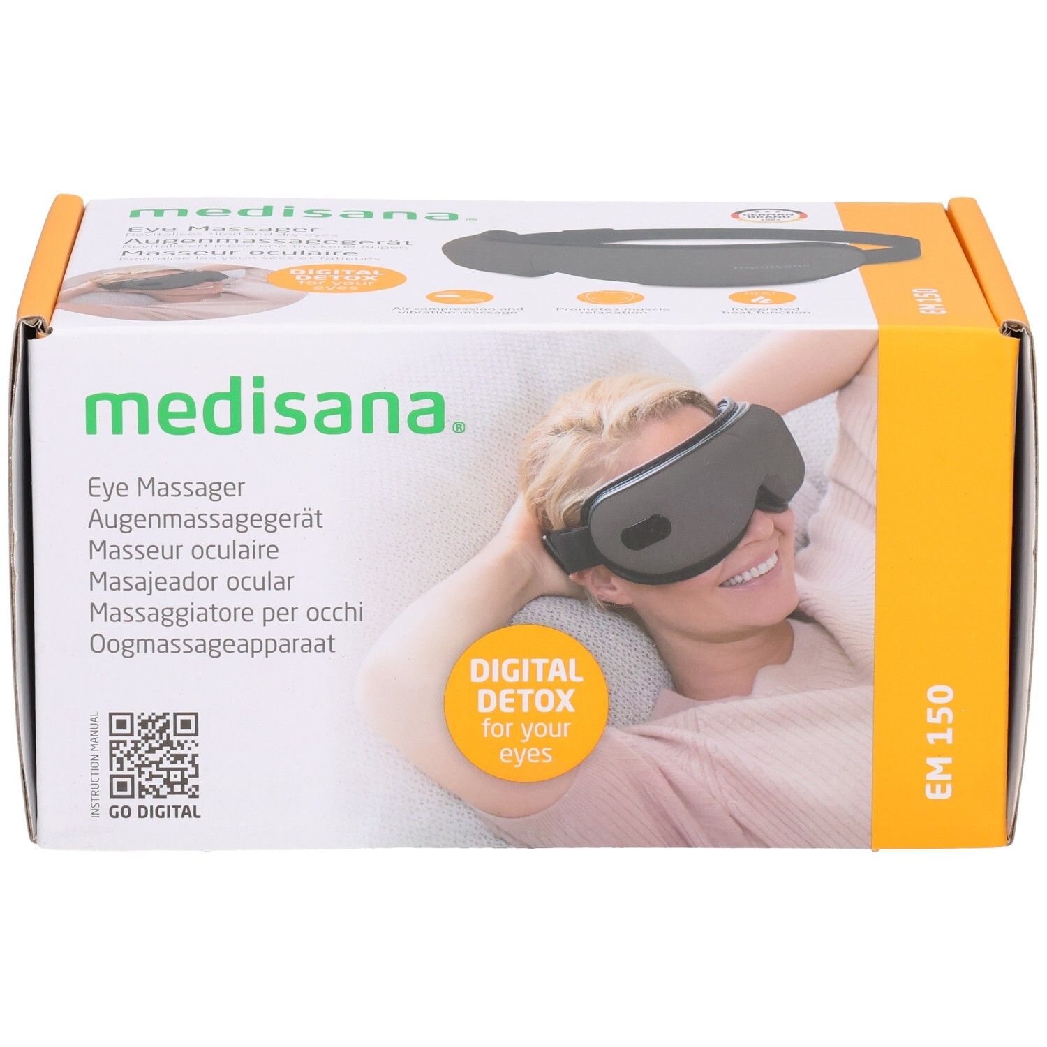 Emballage du masseur oculaire Medisana EM 150 avec une femme portant l'appareil.