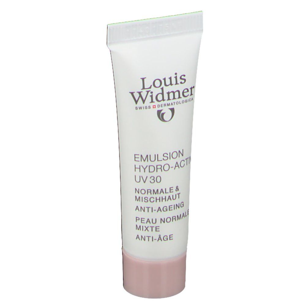 Tube Louis Widmer Emulsion Hydro-Active UV30. Blanc, bouchon rose. Informations produit et logo.