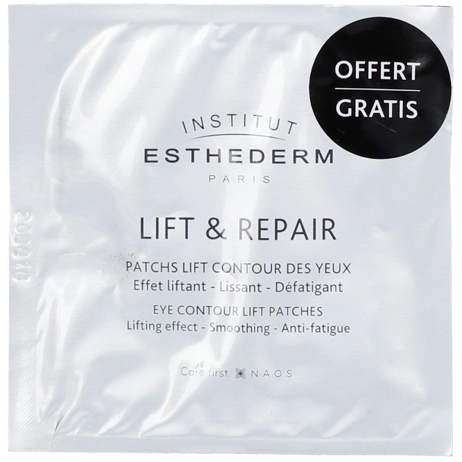 Sachet individuel de patchs lift contour des yeux. Inscription: Institut Esthederm, Lift & Repair, Offert Gratis. Cercle noir avec texte blanc.
