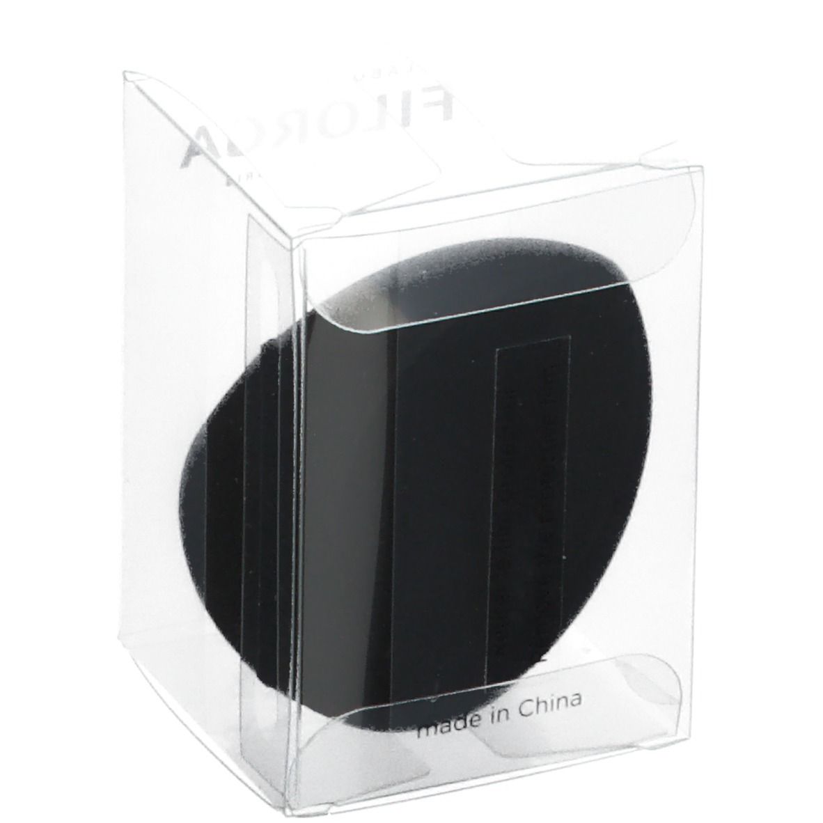 Éponge de maquillage noire dans un emballage transparent. Marque FILORGA. Inscription : MAKE-UP BLENDER. Fabriqué en Chine.