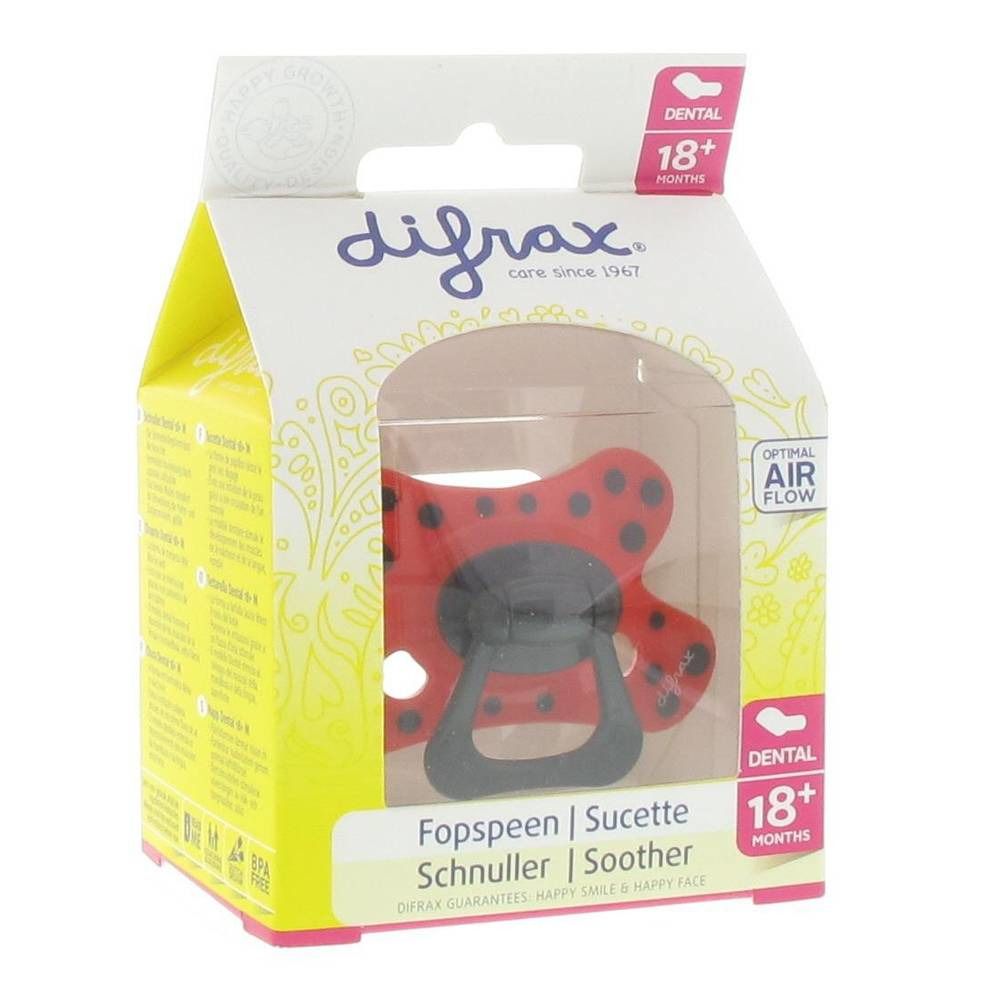 Sucette rouge à pois noirs, emballée. Recommandé pour les bébés de plus de 18 mois. Marque: Difrax.