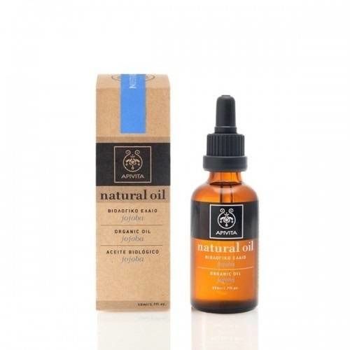 Flacon en verre ambré avec pipette et emballage en carton. Inscription : Apivita Natural Oil, Jojoba.