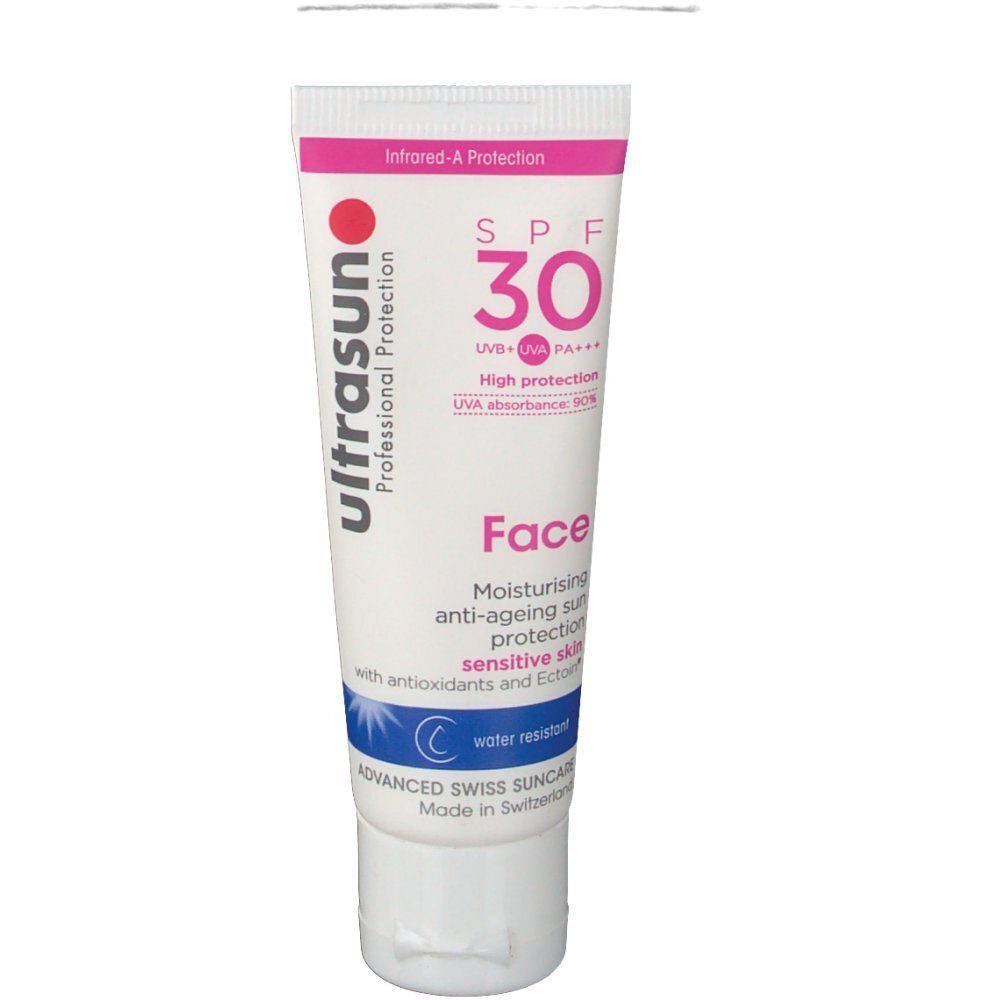 Tube Ultrasun Facecream SPF30 Mini. Blanc, accents roses et bleus. Texte: SPF 30, Face, résistant à l'eau. Marque Ultrasun.