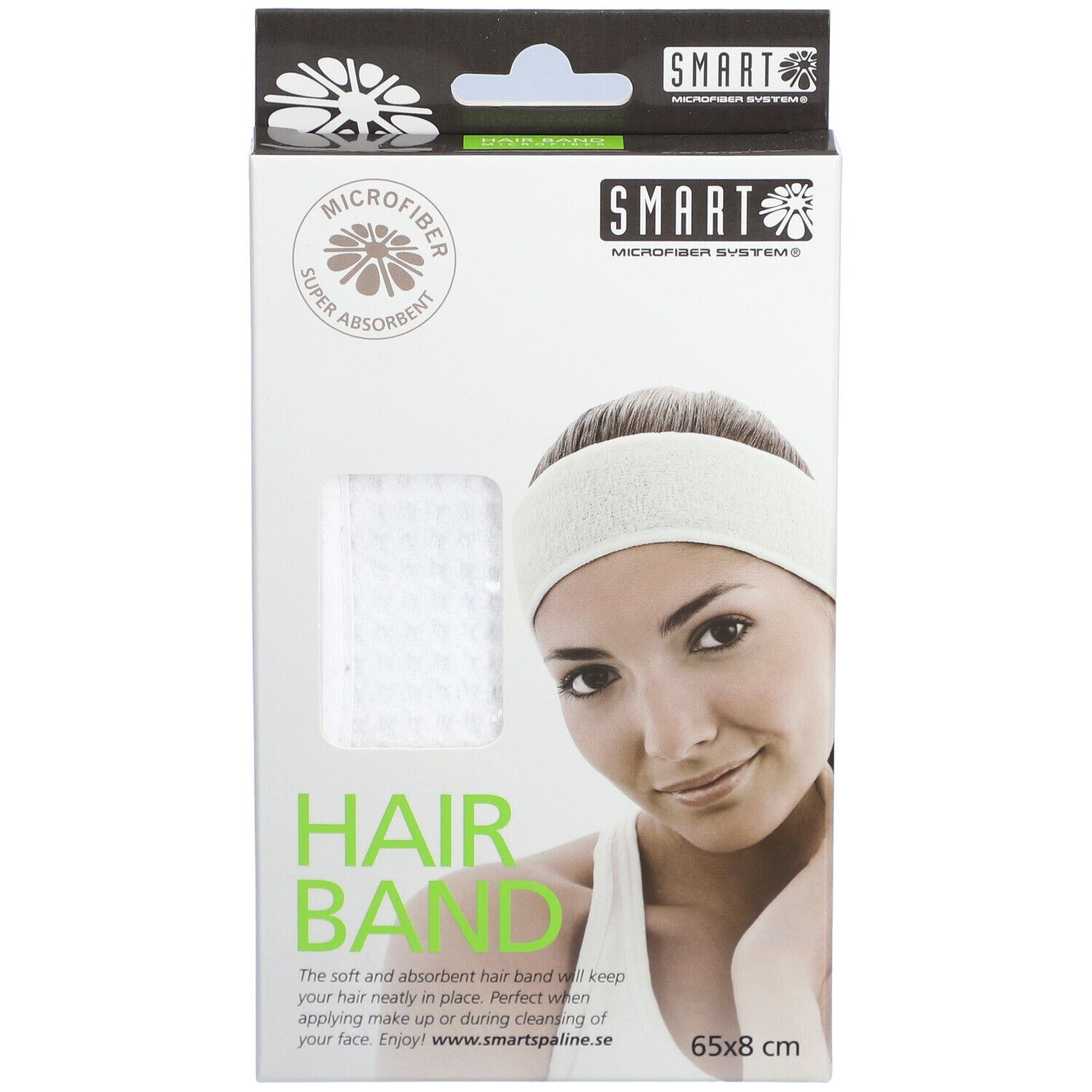 Emballage avec bandeau blanc. Marque SMART. Inscription: MICROFIBER, HAIR BAND, 65x8 cm. Illustration d'une femme portant un bandeau.