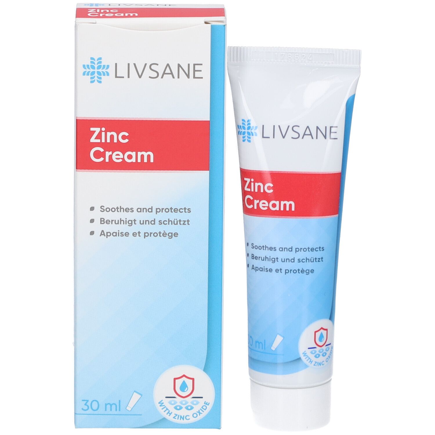 Boîte et tube de crème au zinc LIVSANE. Blanc, bleu et rouge. Contient de l'oxyde de zinc. Texte : Soothes and protects, Beruhigt und schützt, Apaise et protège.