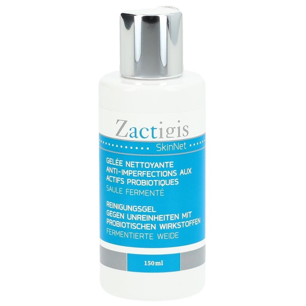 Flacon blanc avec bouchon argenté. Étiquette bleue avec texte: Zactigis, Gel nettoyant anti-imperfections. 150ml.