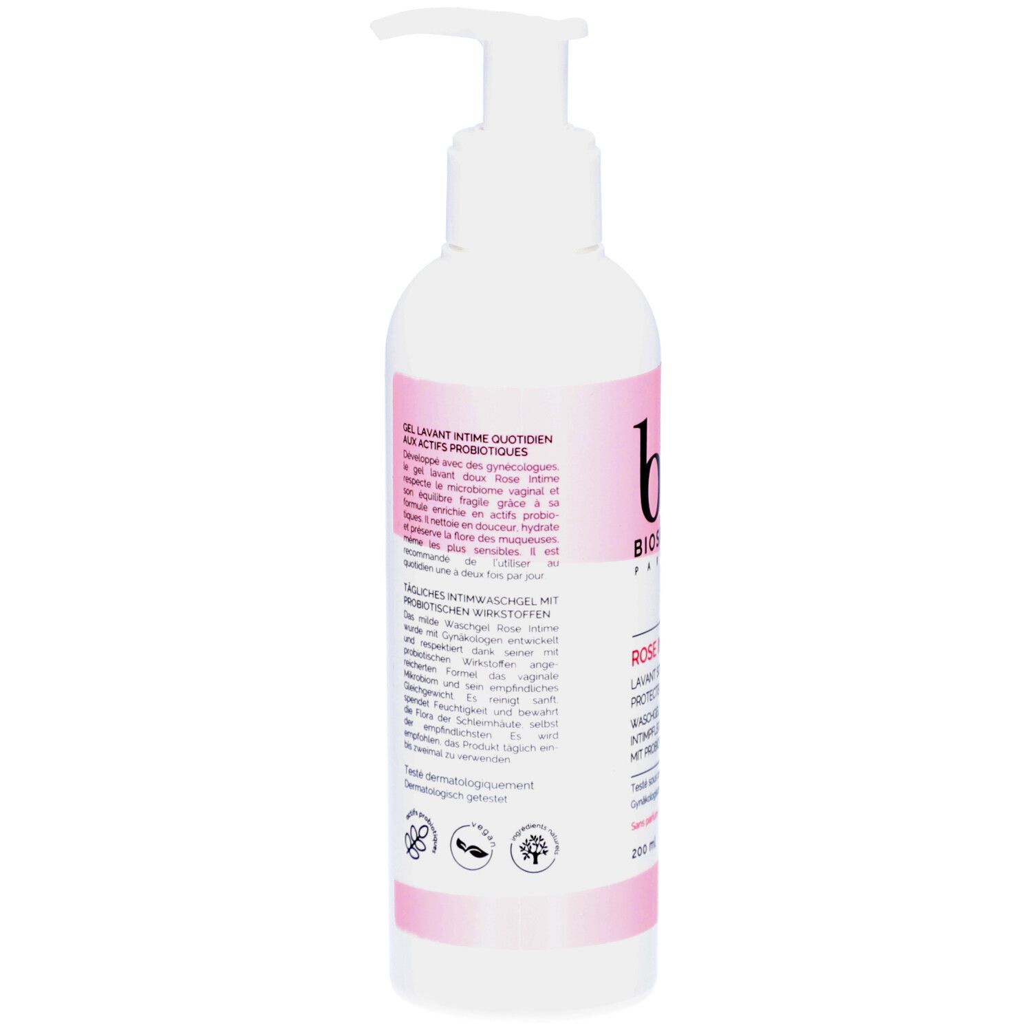Dos du flacon blanc. Texte multilingue. Détail rose. Ingrédients et certifications.