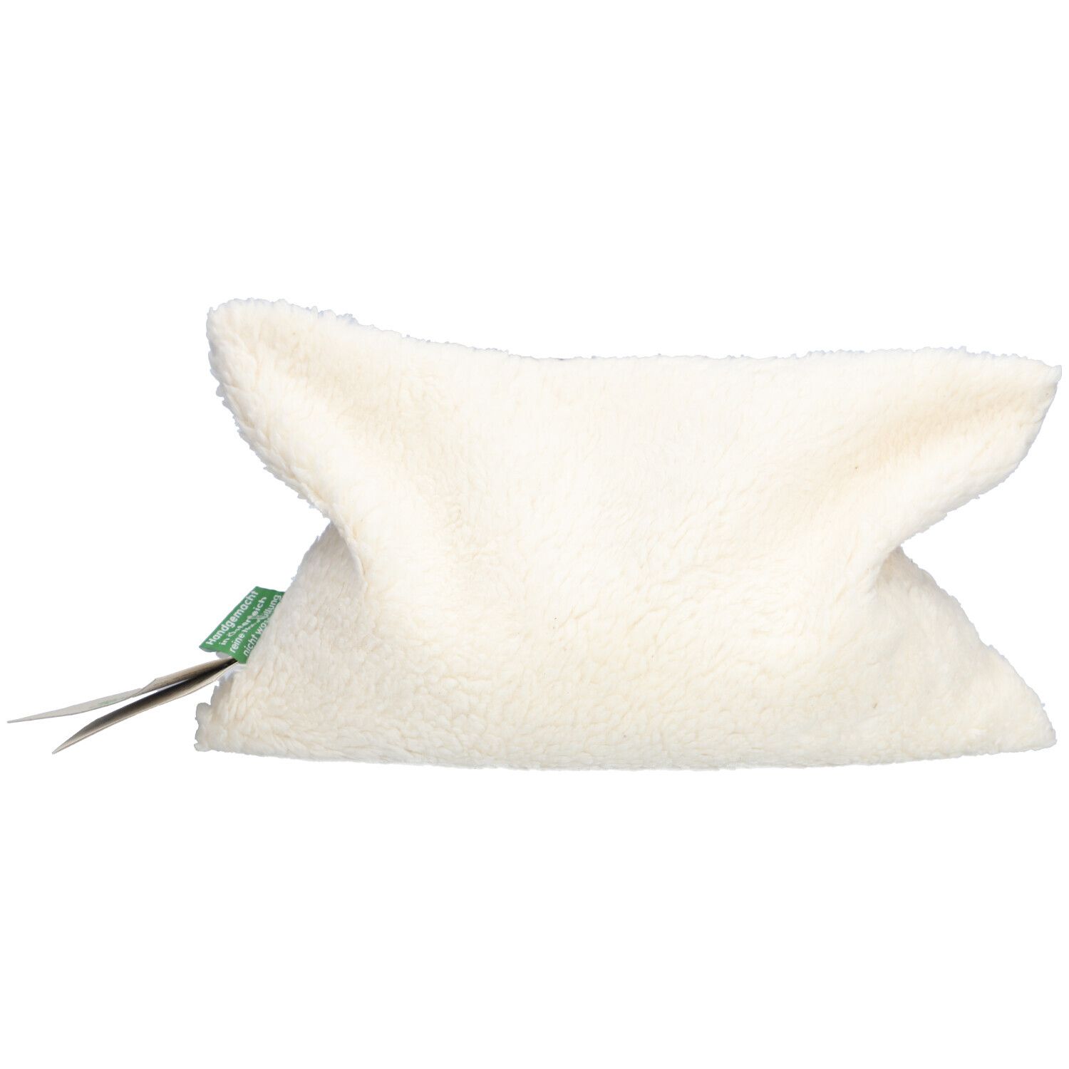 Coussin aux noyaux de cerises beige en matière douce. Rectangulaire, étiquette verte. Marque HIMMELGRÜN® visible.