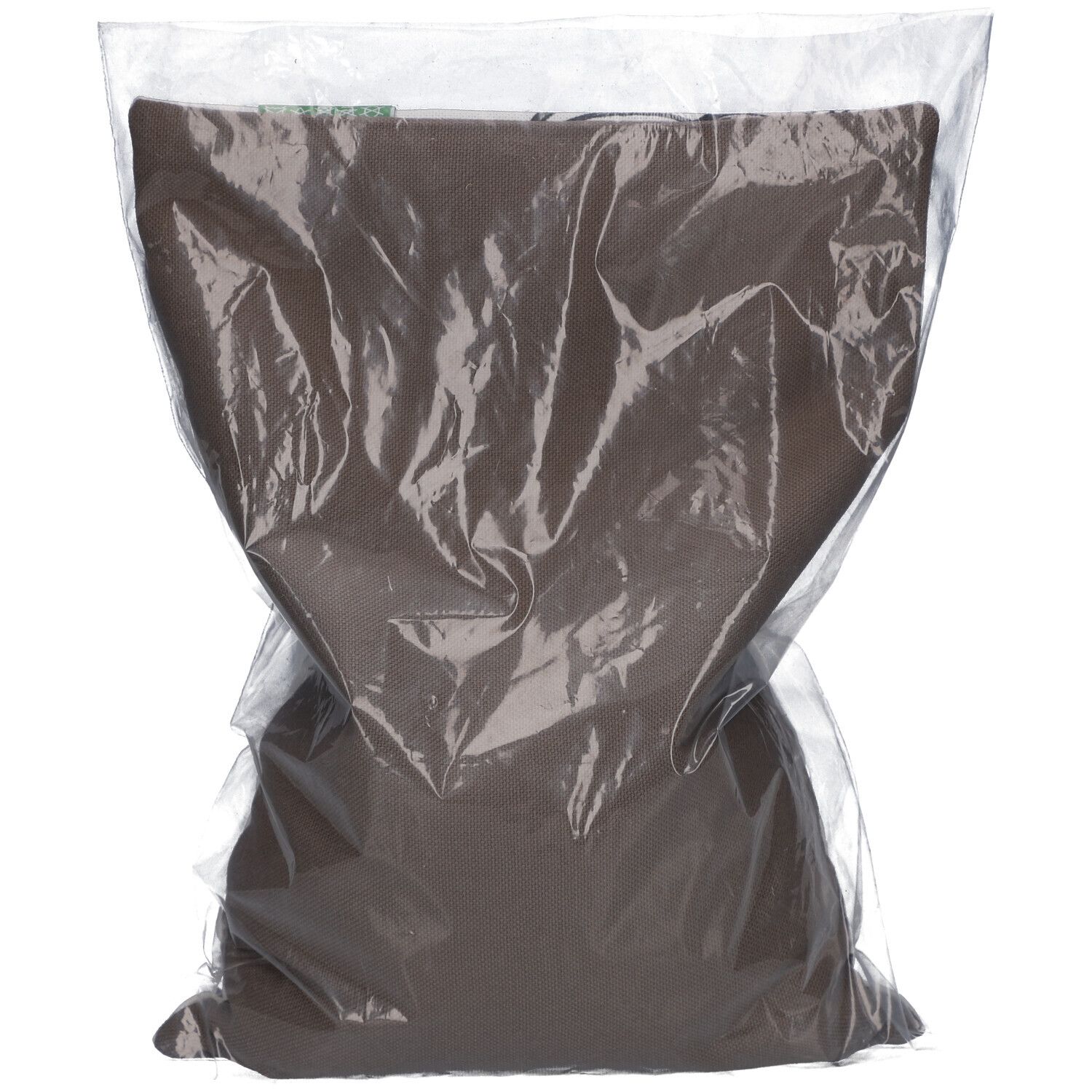 Coussin marron dans un emballage plastique transparent. Le coussin est enveloppé dans l'emballage.