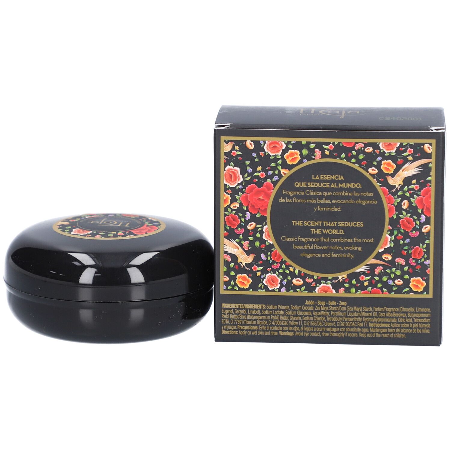 Savon et emballage. Savon noir ovale et emballage à motifs floraux. Texte sur l'emballage.