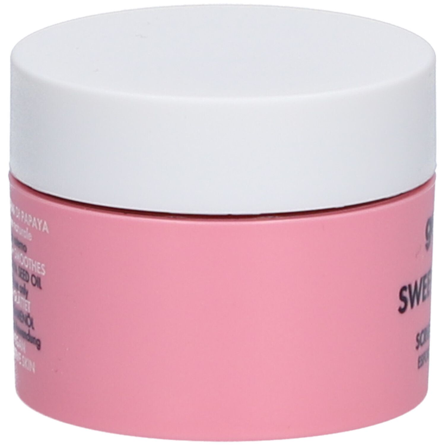 Un pot rond rose avec un couvercle blanc. Le texte sur le pot est partiellement visible.