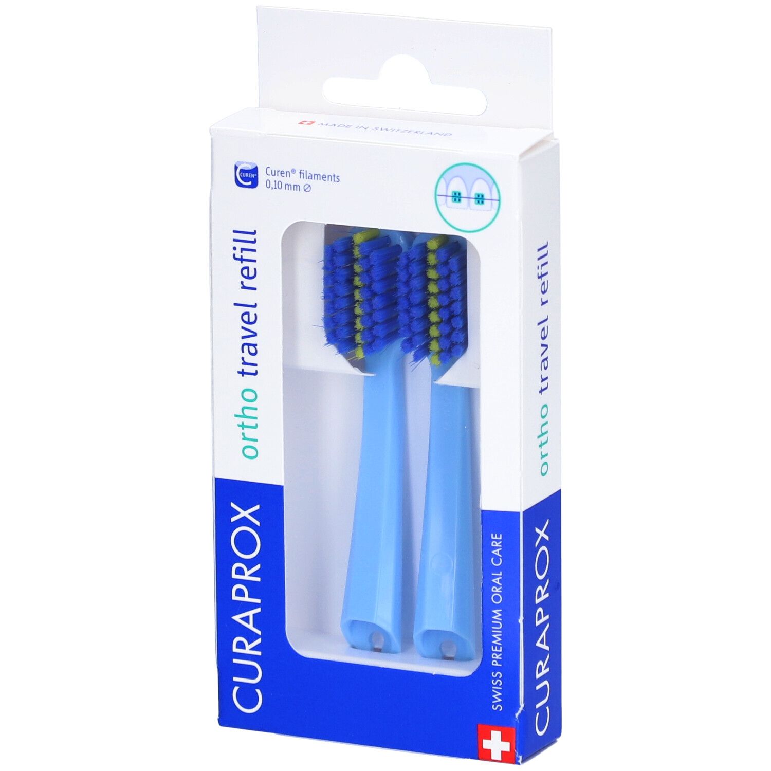 Deux têtes de brosse à dents bleues avec des poils jaunes dans un emballage blanc. Inscription : CURAPROX, ortho travel refill.