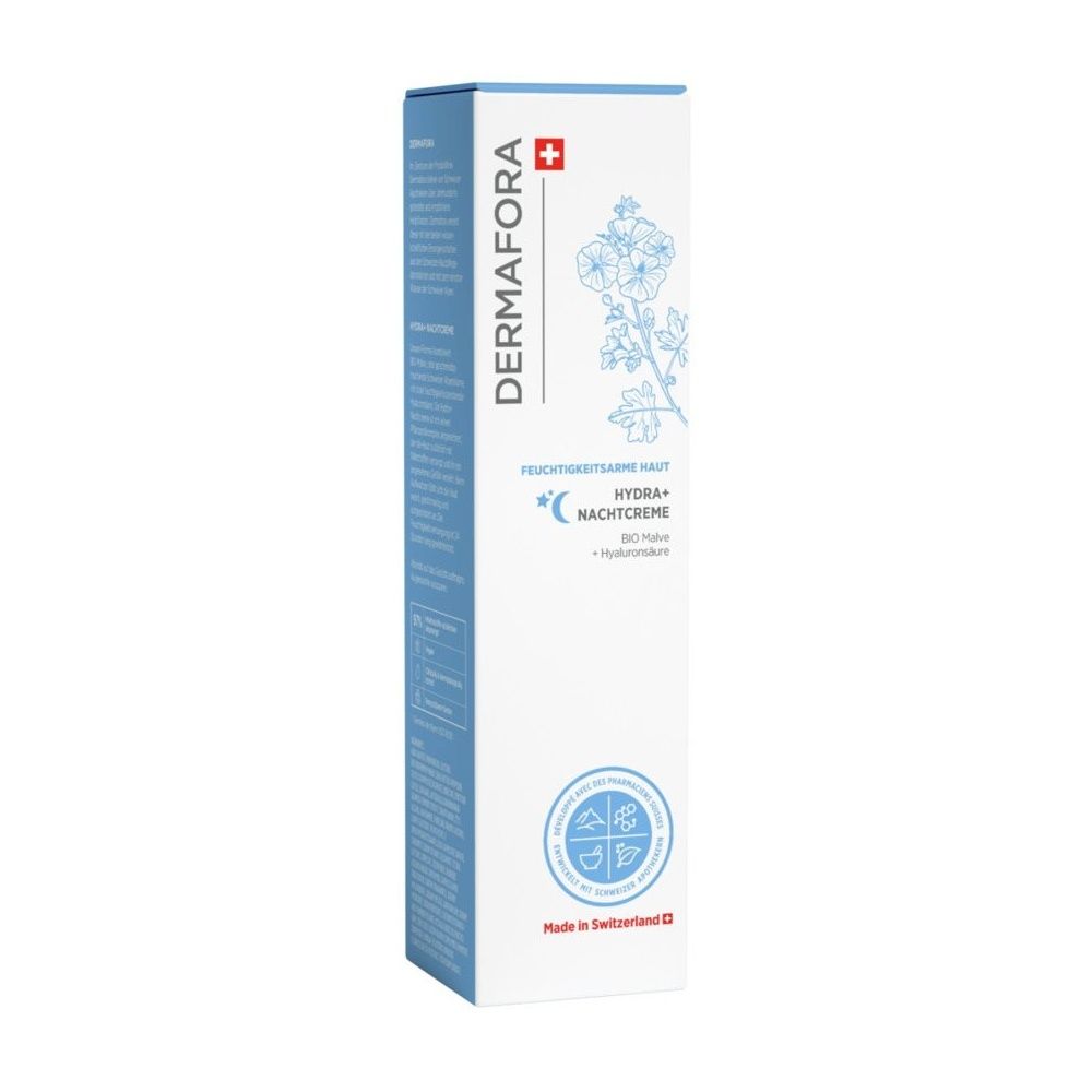 Emballage bleu et blanc de DERMAFORA Crème Nuit Hydra+. Croix suisse et motif floral. Texte : Peaux déshydratées.