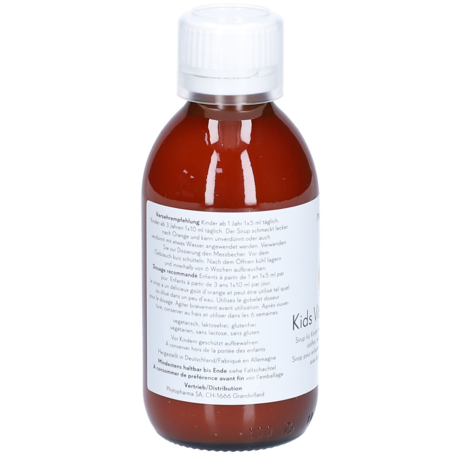 Dos de la bouteille. Étiquette avec texte, recommandation de dosage et ingrédients. Étiquette blanche sur bouteille marron.