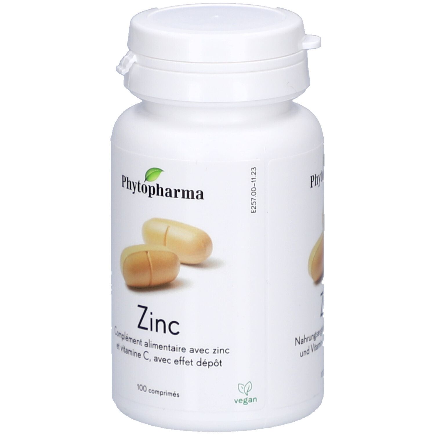 Flacon blanc avec comprimés. Inscription: Phytopharma, Zink, 100 comprimés. Label vegan.