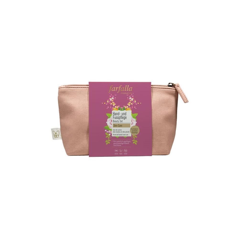 Trousse de toilette rose avec fermeture éclair et étiquette violette. Étiquette avec nom du produit et logo.