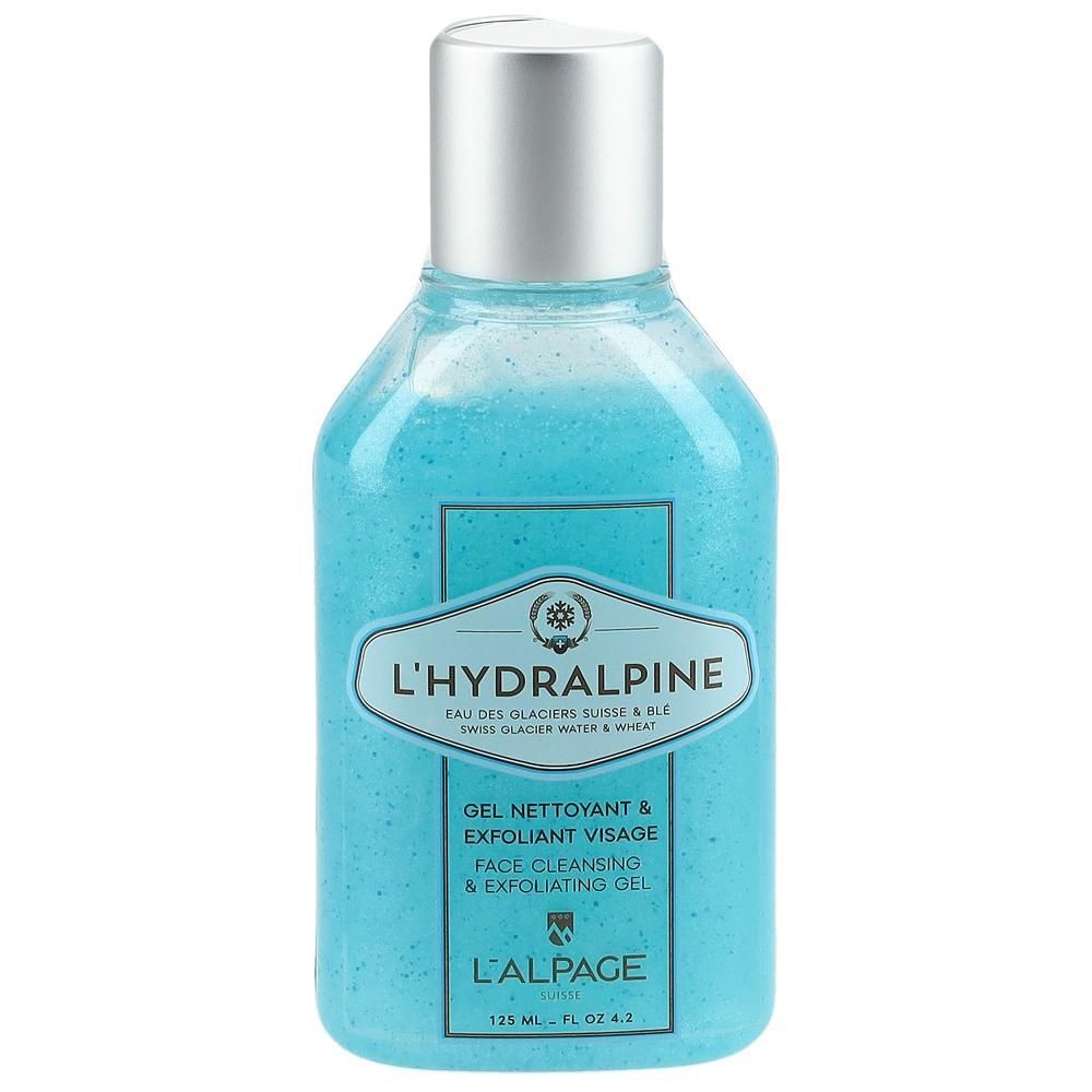 Gel bleu dans un flacon à bouchon argenté. Inscription : L'Hydralpine, Gel Nettoyant & Exfoliant Visage, Face Cleansing & Exfoliating Gel.