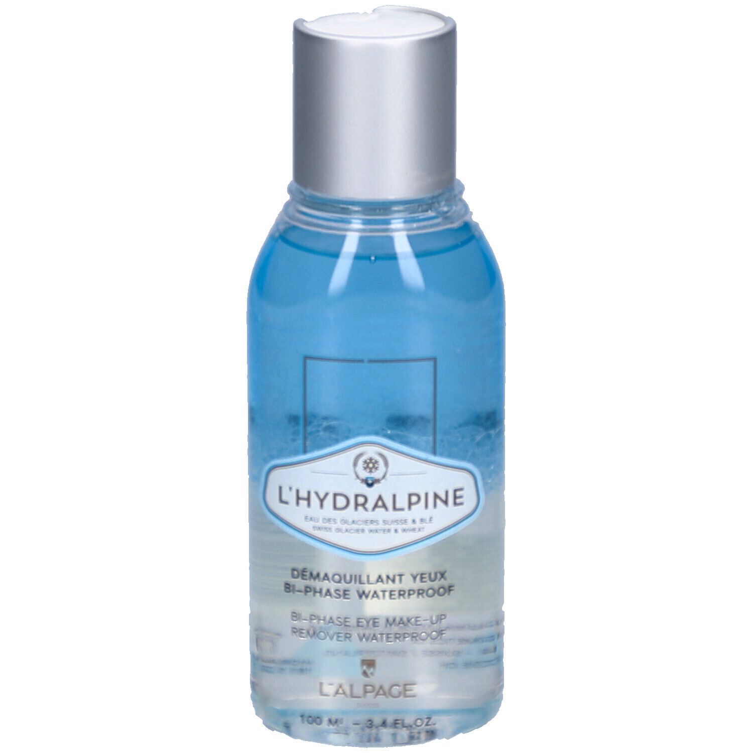 Flacon avec contenu bleu et clair. Bouchon argenté. Inscription: L'Hydralpine, Démaquillant Yeux Bi-Phase Waterproof.