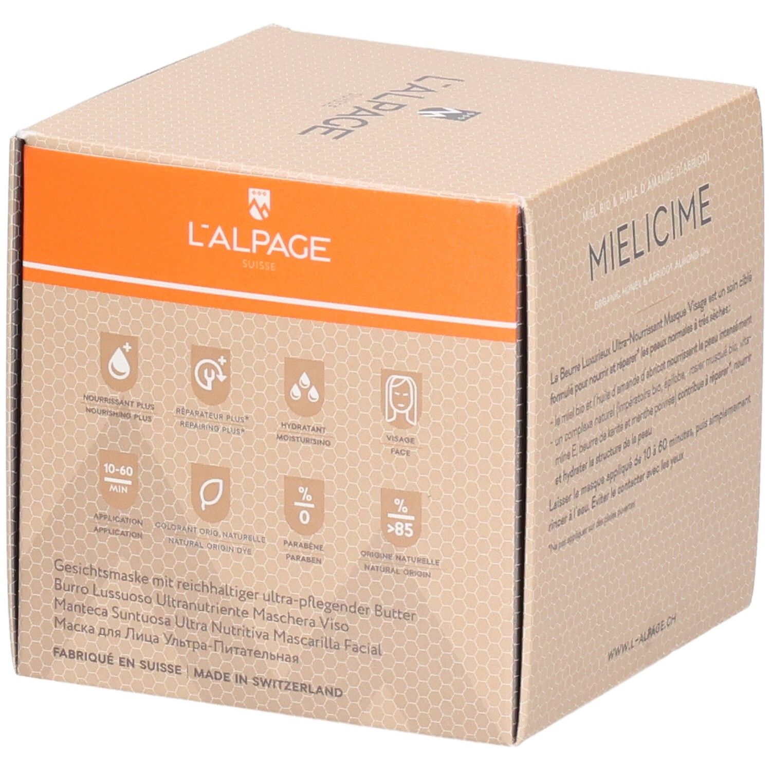 Boîte en carton avec description du produit et icônes. Accent orange. Texte : Masque visage. Marque : L'ALPAGE.