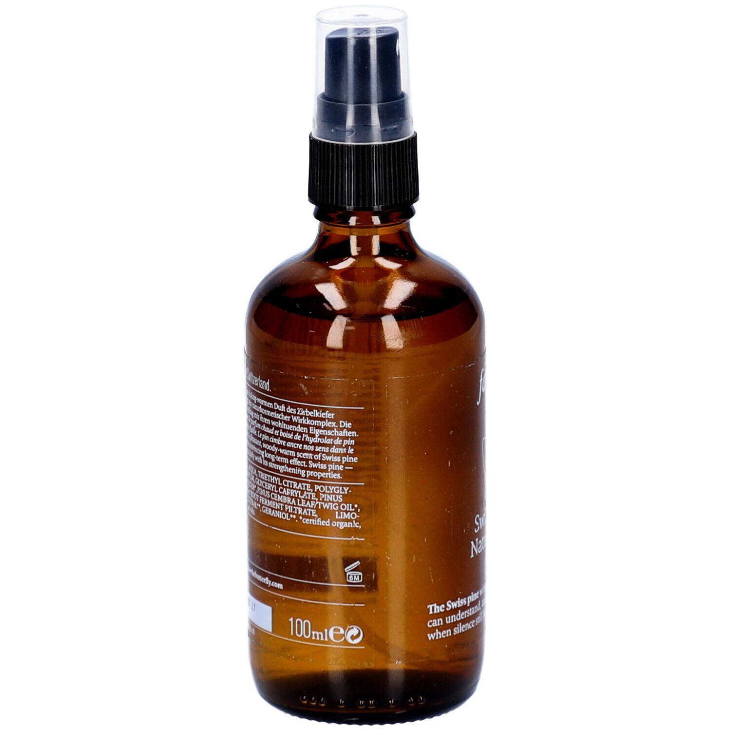 Flacon en verre brun avec vaporisateur. Dos avec texte et informations sur les ingrédients. 100ml.