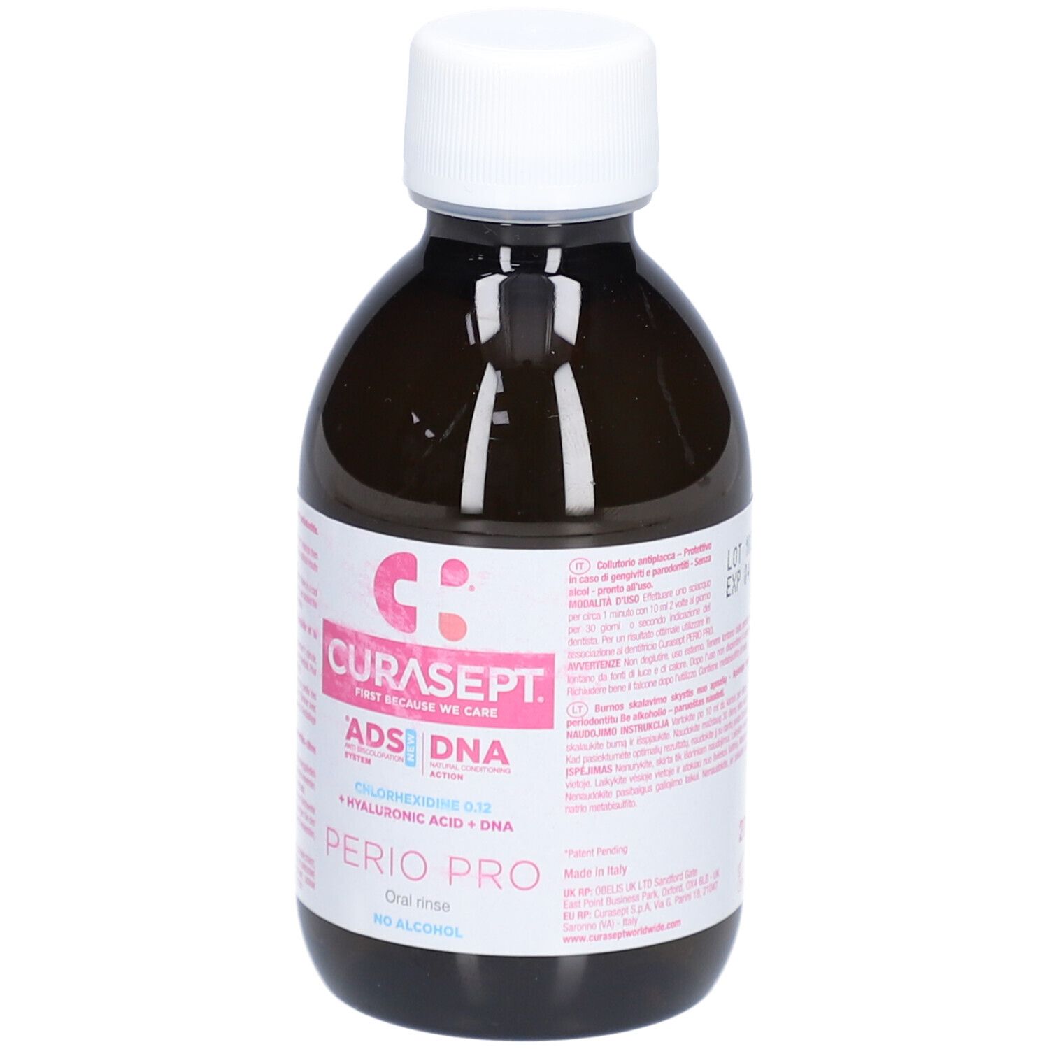Flacon brun avec bouchon blanc. Étiquette rose avec texte: CURASEPT, ADS DNA, PERIO PRO, Chlorhexidine 0,12, Acide hyaluronique + ADN, sans alcool.