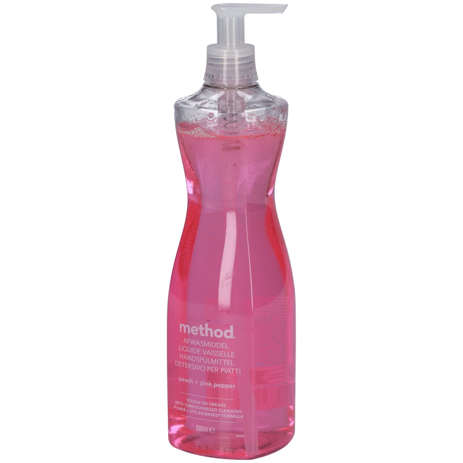 Flacon de liquide vaisselle rose, distributeur transparent. Inscription: method, Peach + Pink Pepper.