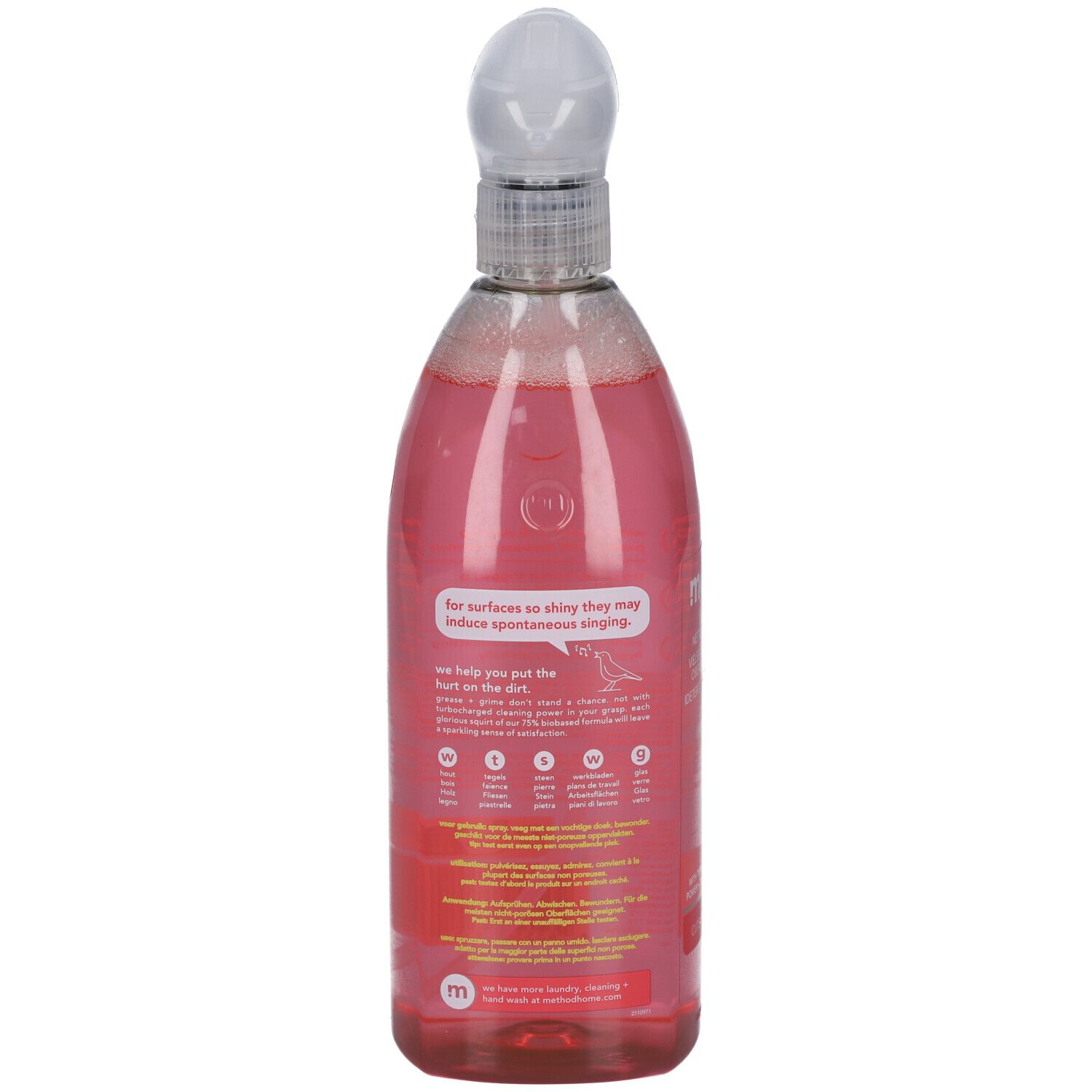 Dos d'un flacon pulvérisateur rose. Texte : informations sur le produit, ingrédients, recyclable.
