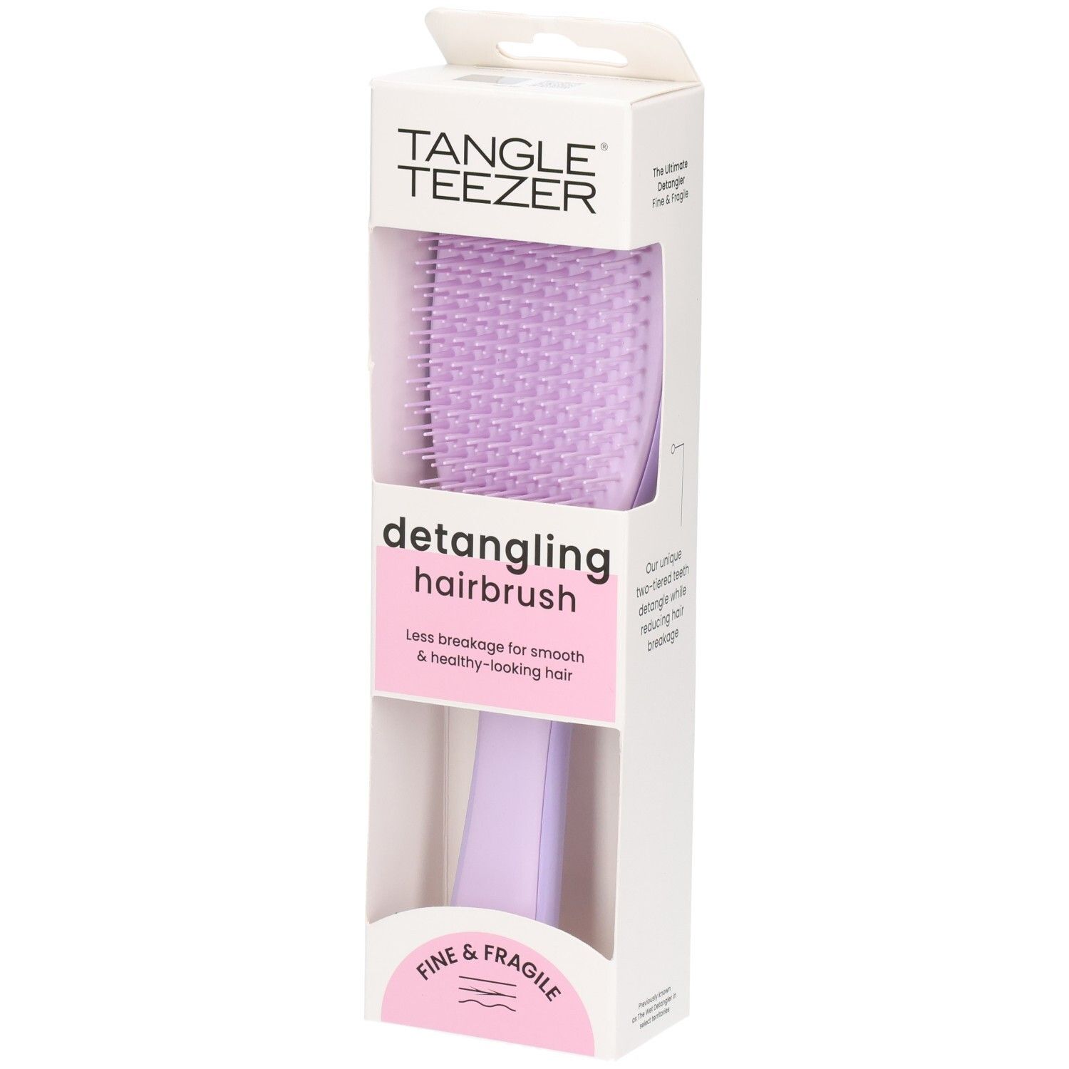 Brosse démêlante dans son emballage. Brosse violette avec manche. Marque : Tangle Teezer. Texte : Fine & Fragile.