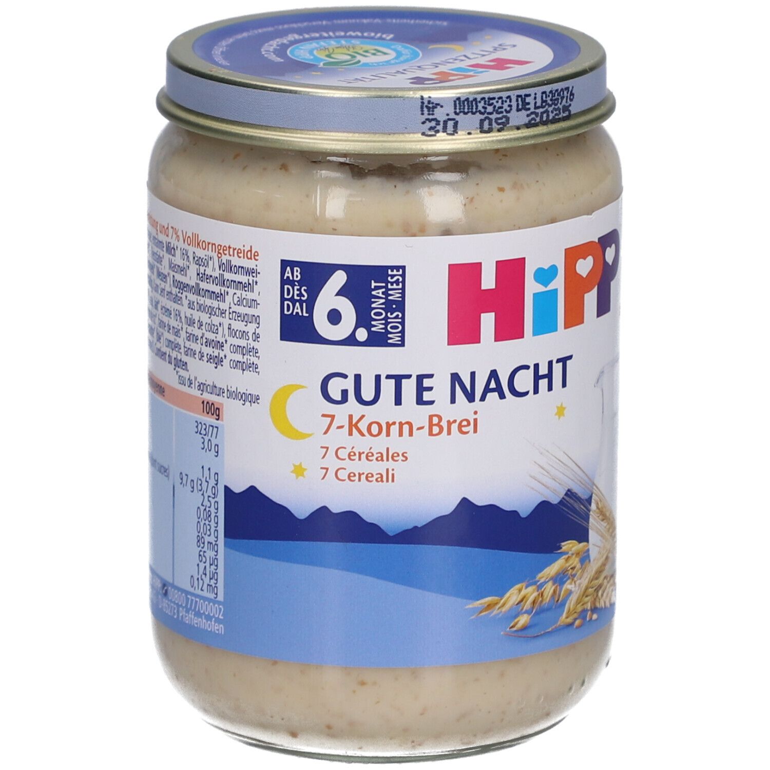 Pot de purée pour bébé. Inscription: HIPP Gute Nacht 7-Korn-Brei. Dès 6 mois. Illustration d'épis de céréales.