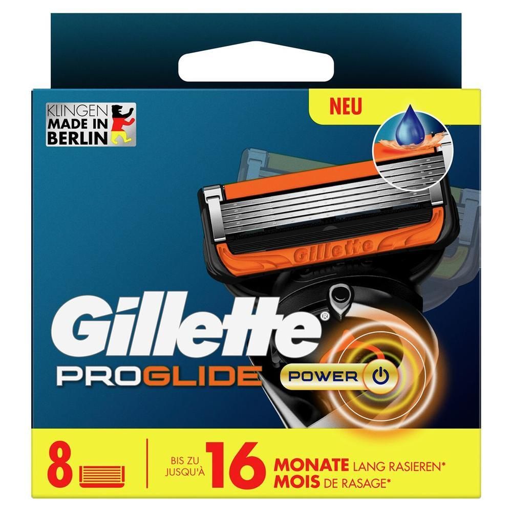 Paquet de lames de rasoir. Contient 8 lames. Marque Gillette ProGlide Power. Texte: 16 mois de rasage. Avec logo et image du produit.