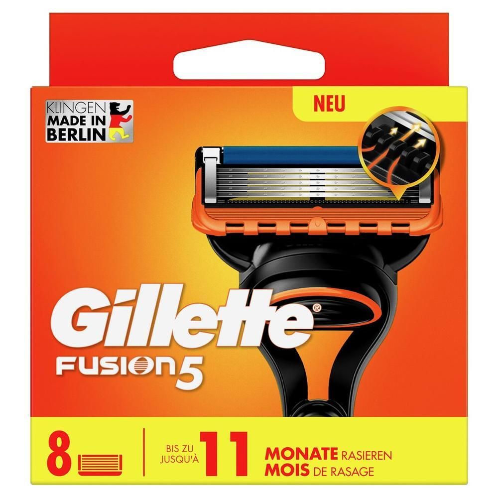 Boîte de lames de rasoir. Carton orange avec logo Gillette Fusion5. 8 lames, jusqu'à 11 mois de rasage.