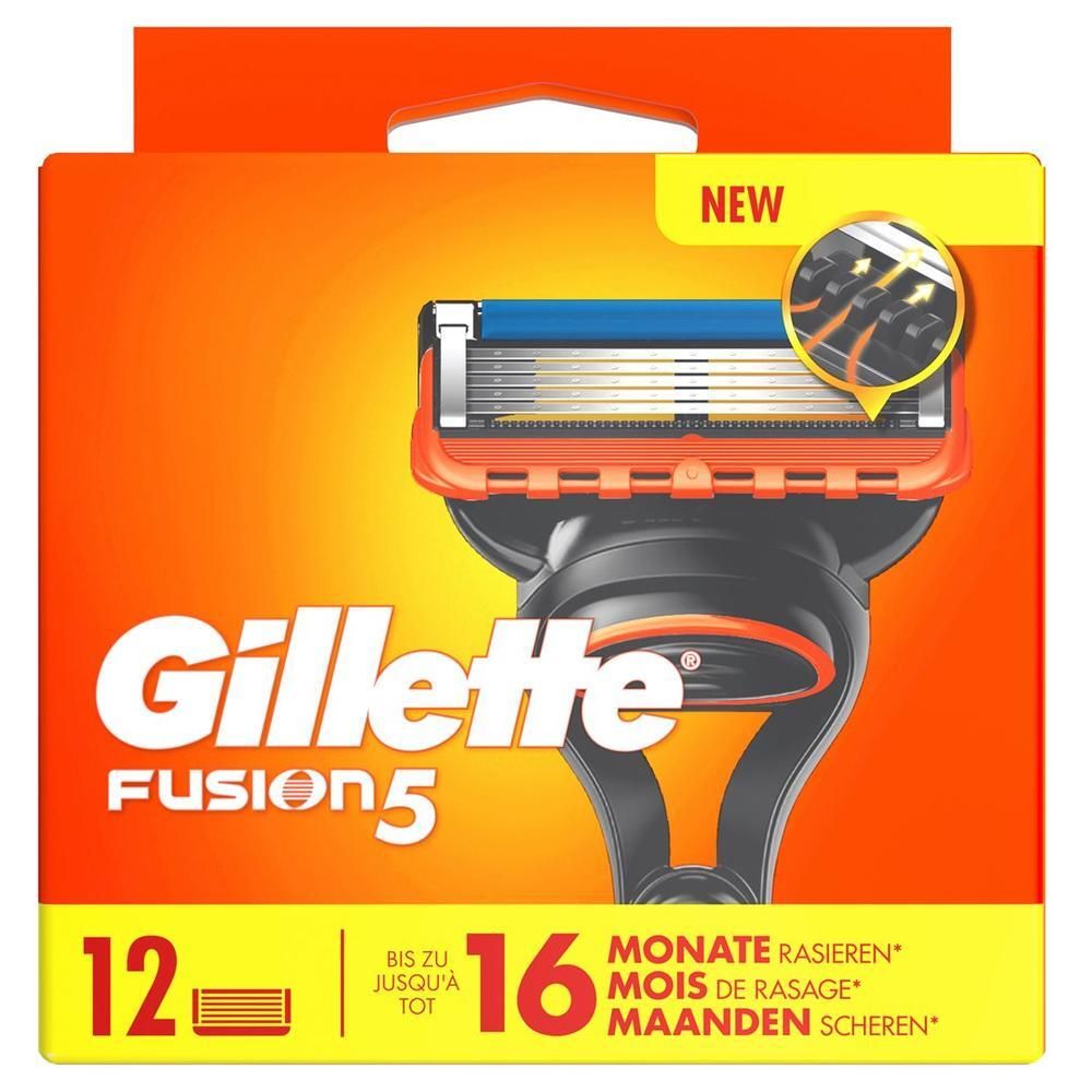 Paquet de lames Gillette Fusion5. Emballage orange avec image de rasoir. 12 lames, 16 mois de rasage. Étiquette "NEW".