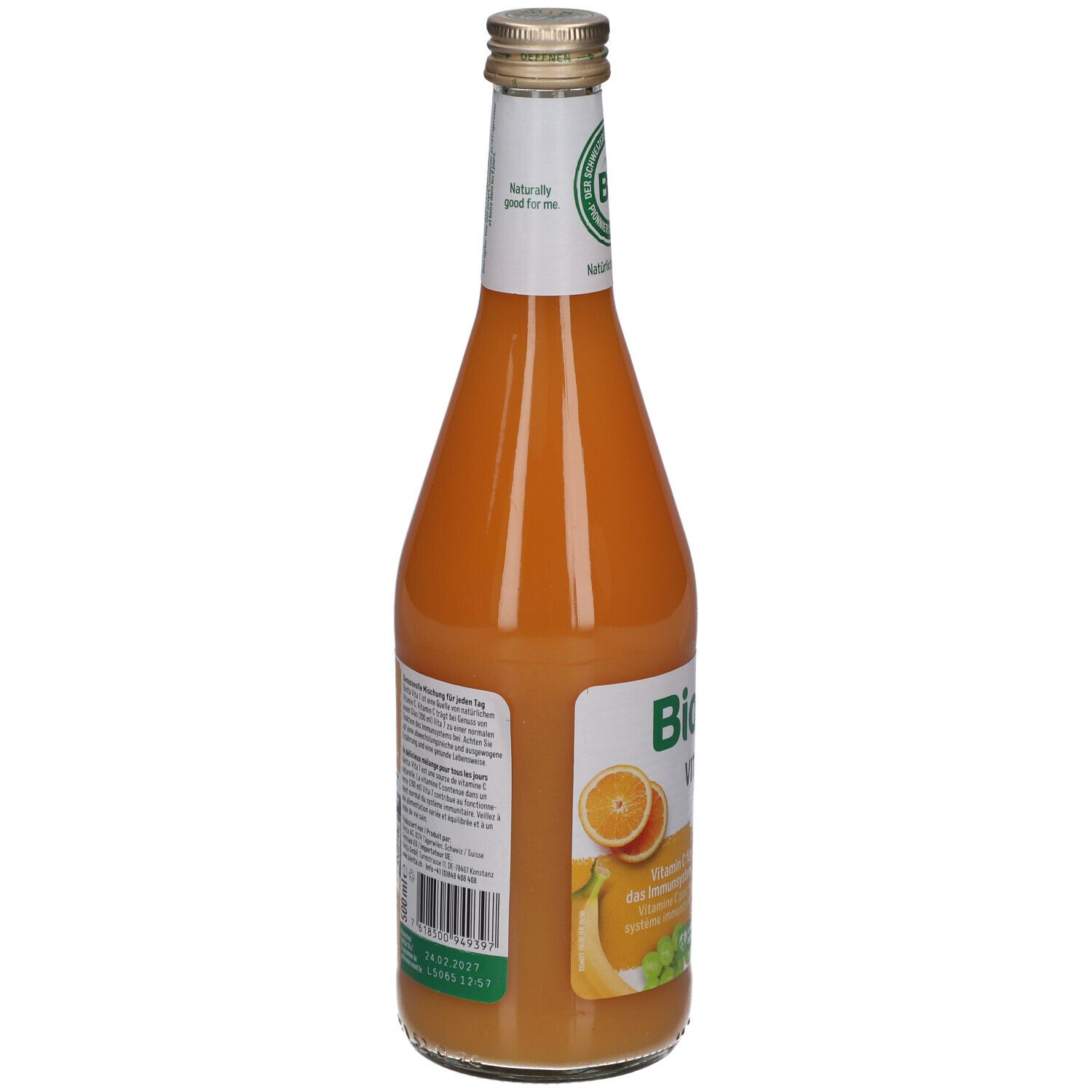 Dos de la bouteille en verre BIOTTA Vita 7. Étiquette avec texte et code-barres. Label BIO. Jus orange visible.